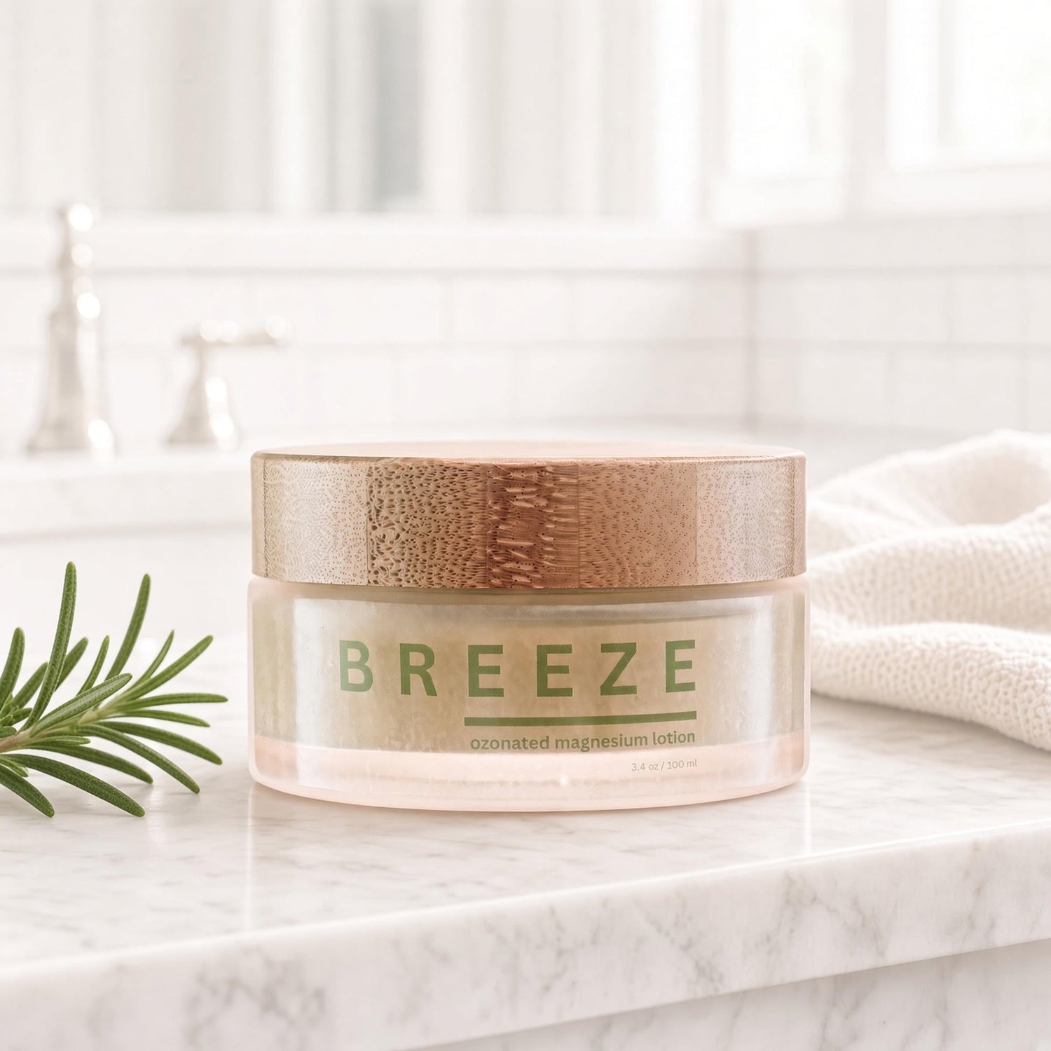 Kōzōn Breeze Ozonated Magnesium Lotion with rosemary on marble